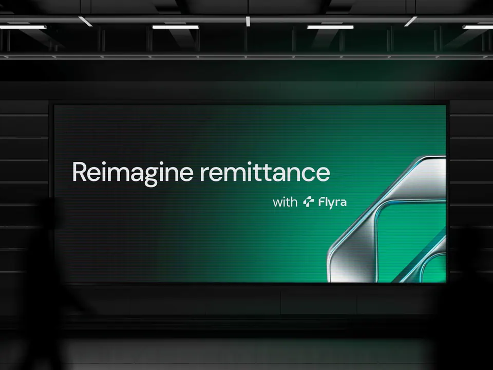 Flyra brand campaign — 'Reimagine remittance' billboard